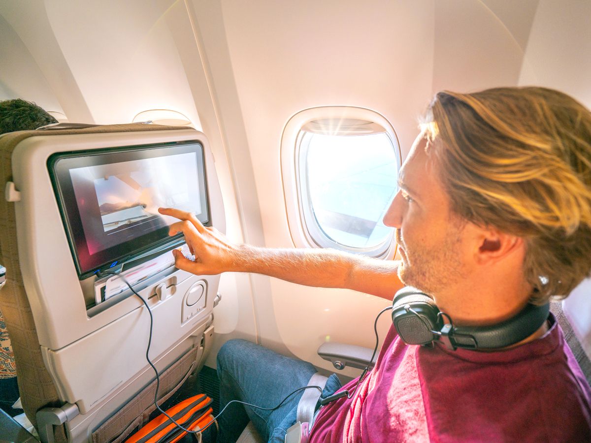 How In-Flight Entertainment Has Changed Over the Decades - Daily Passport